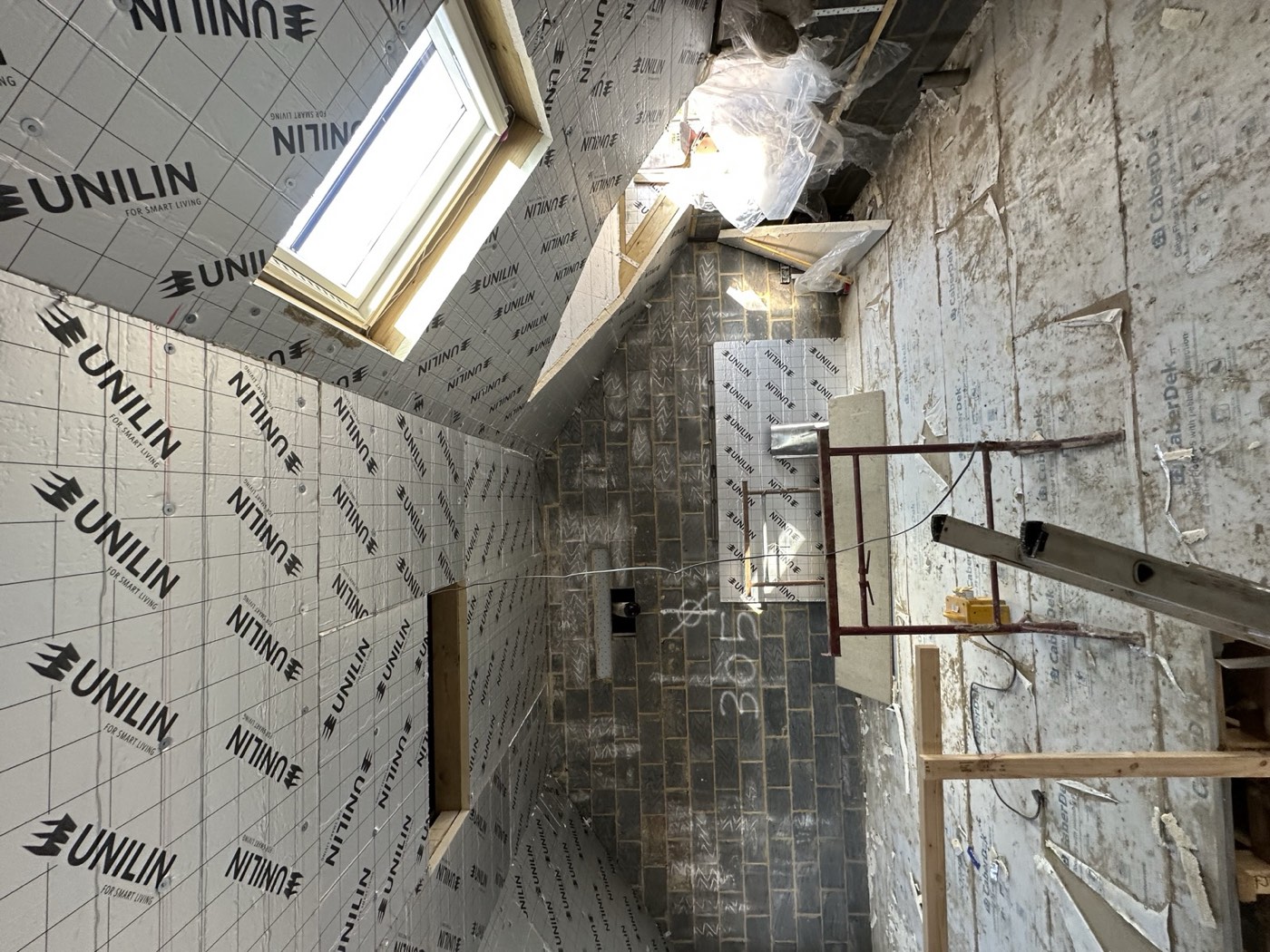 Rigid insulation boards fitted to walls and ceiling