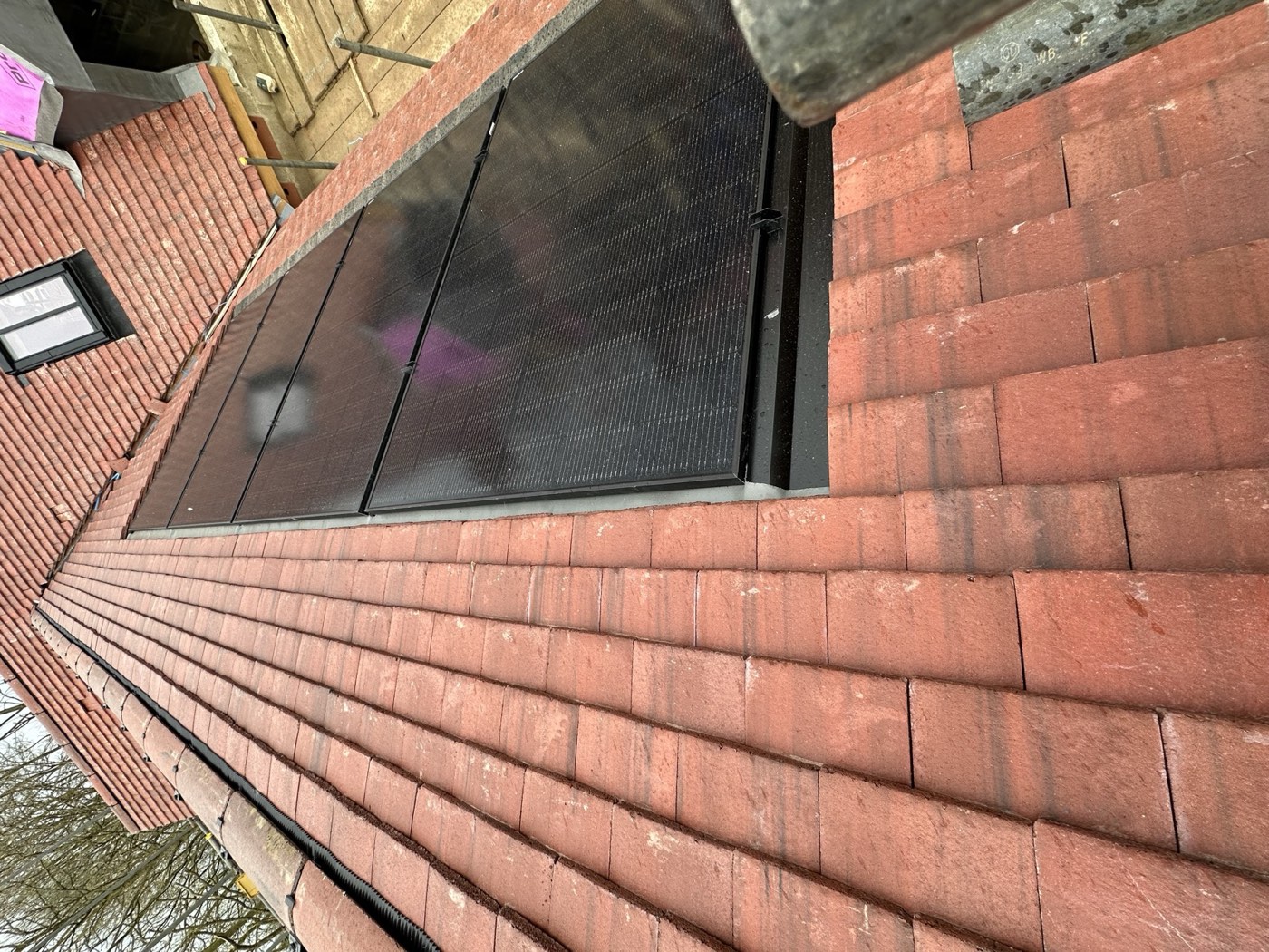 Solar panels integrated into the roof tiles